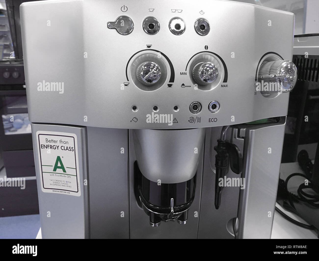 automatic coffee machines at exhibition on white kitchen background
