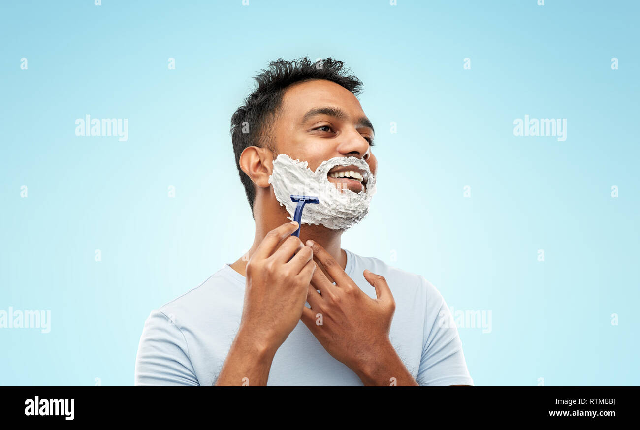 indian man shaving beard with razor blade Stock Photo Alamy