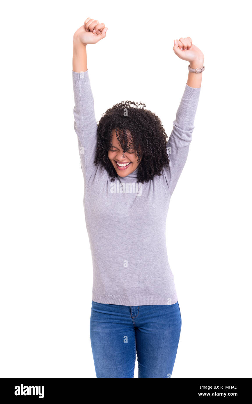 Studio shot of a Very Happy african woman with arms raised Stock Photo ...