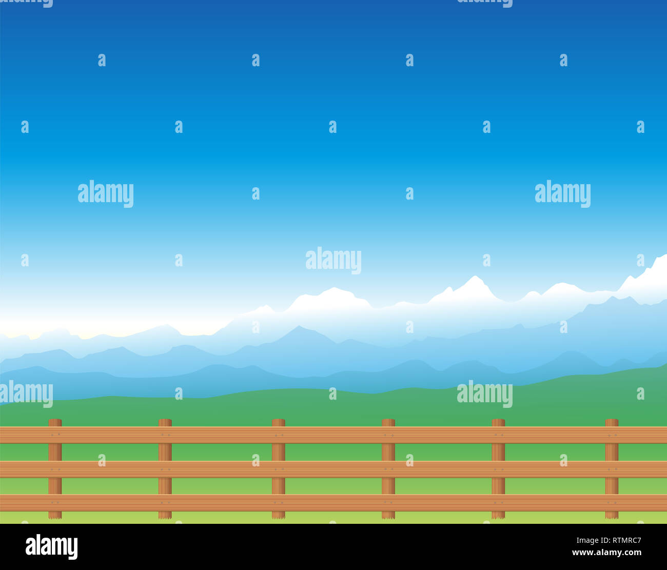 Pasture fence. Lush green summer meadow with blue mountains in background. Stock Photo