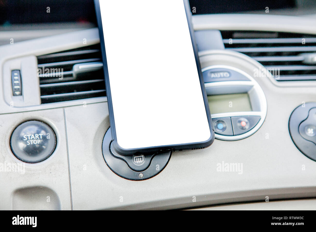 Smartphone in a car use for Navigate or GPS. Driving a car with