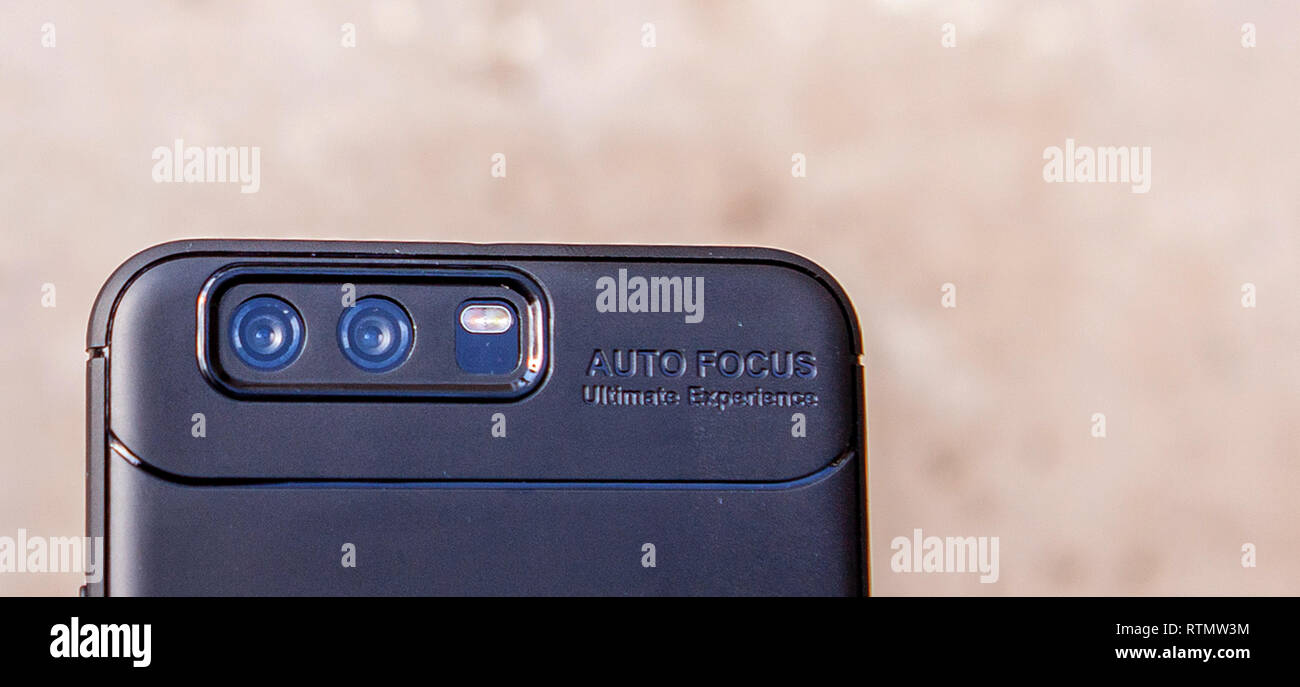 Close up of a Mobile Phone Camera on light background. Stock Photo