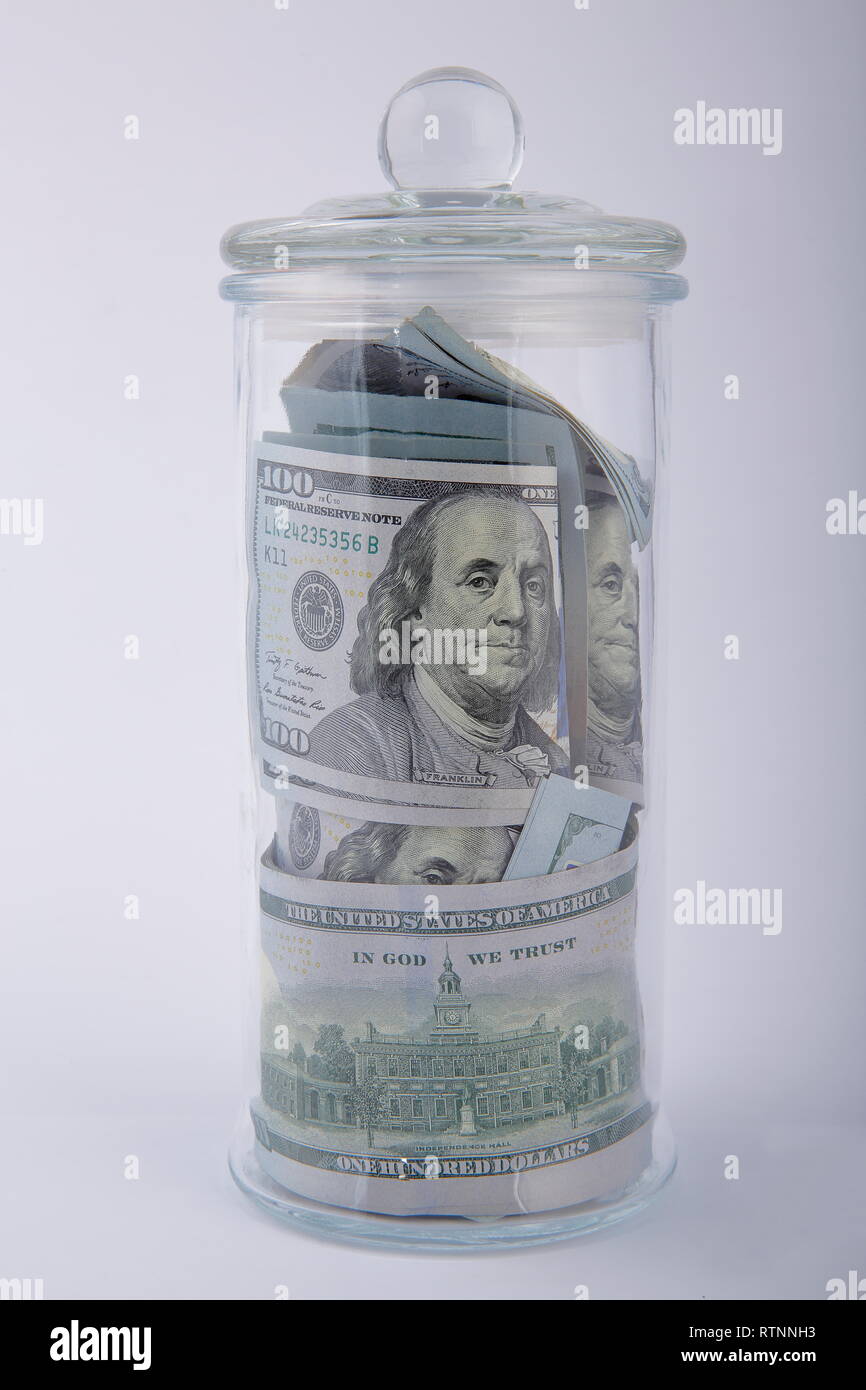 Composition of american dollars in glass jar. Stock Photo