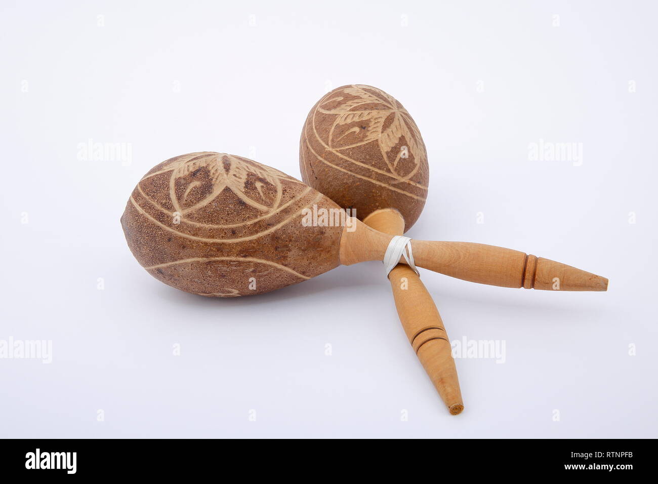 Folkloric musical instruments. A view of Latin rhythm instruments used in Cuban  music, on white background Stock Photo - Alamy