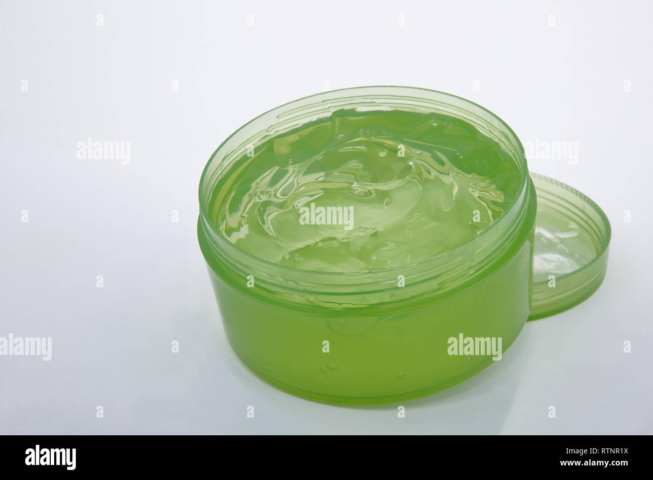 View of a box of aloe vera gel on white background Stock Photo - Alamy