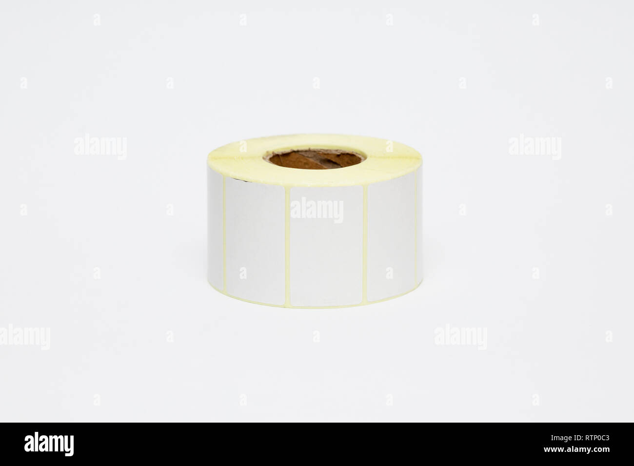 Roll of cash register tape isolated on soft gray background.High