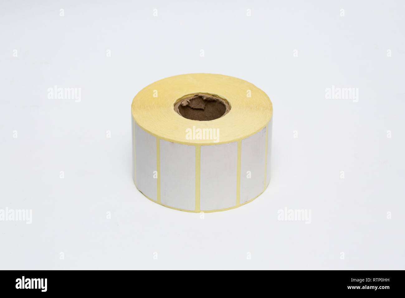 Roll of cash register tape isolated on soft gray background.High