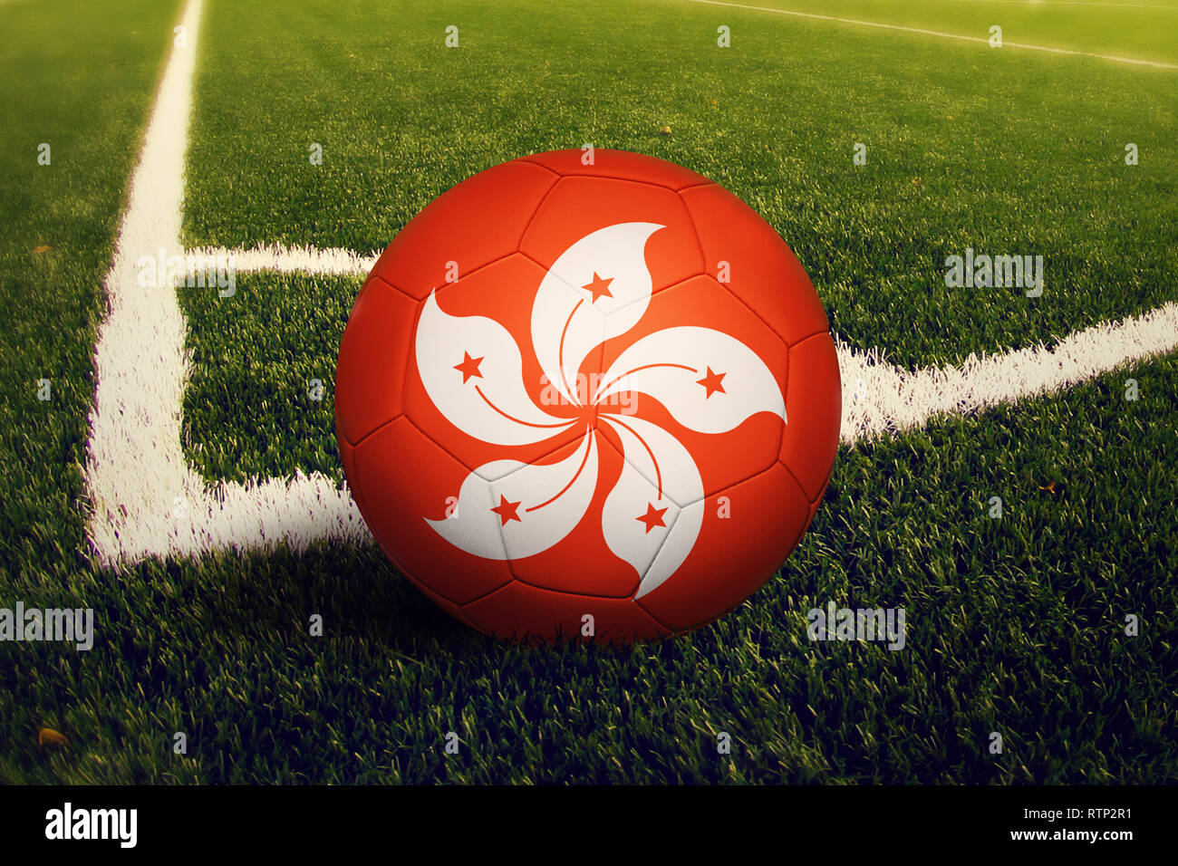 Hong Kong ball on corner kick position, soccer field background
