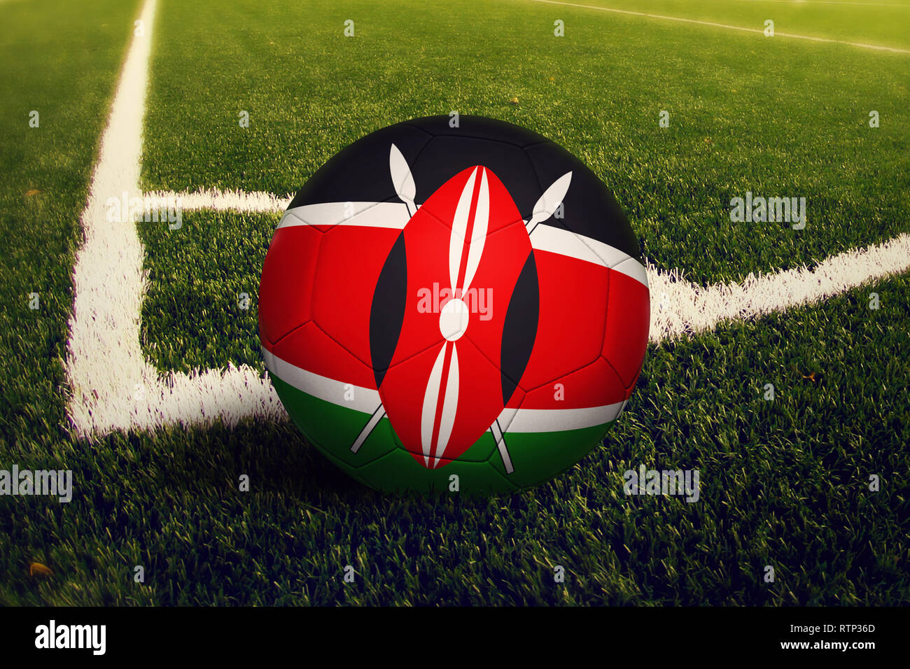 Kenya ball on corner kick position, soccer field background. National football theme on green