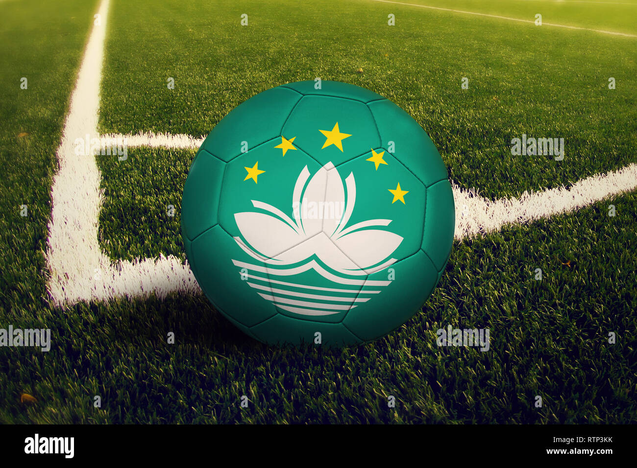 Macao ball on corner kick position, soccer field background. National ...