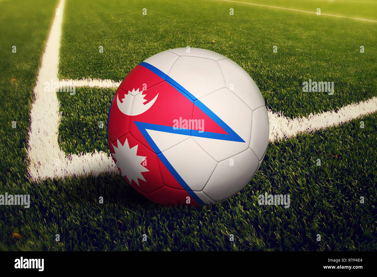 Nepal ball on corner kick position, soccer field background. National football theme on green