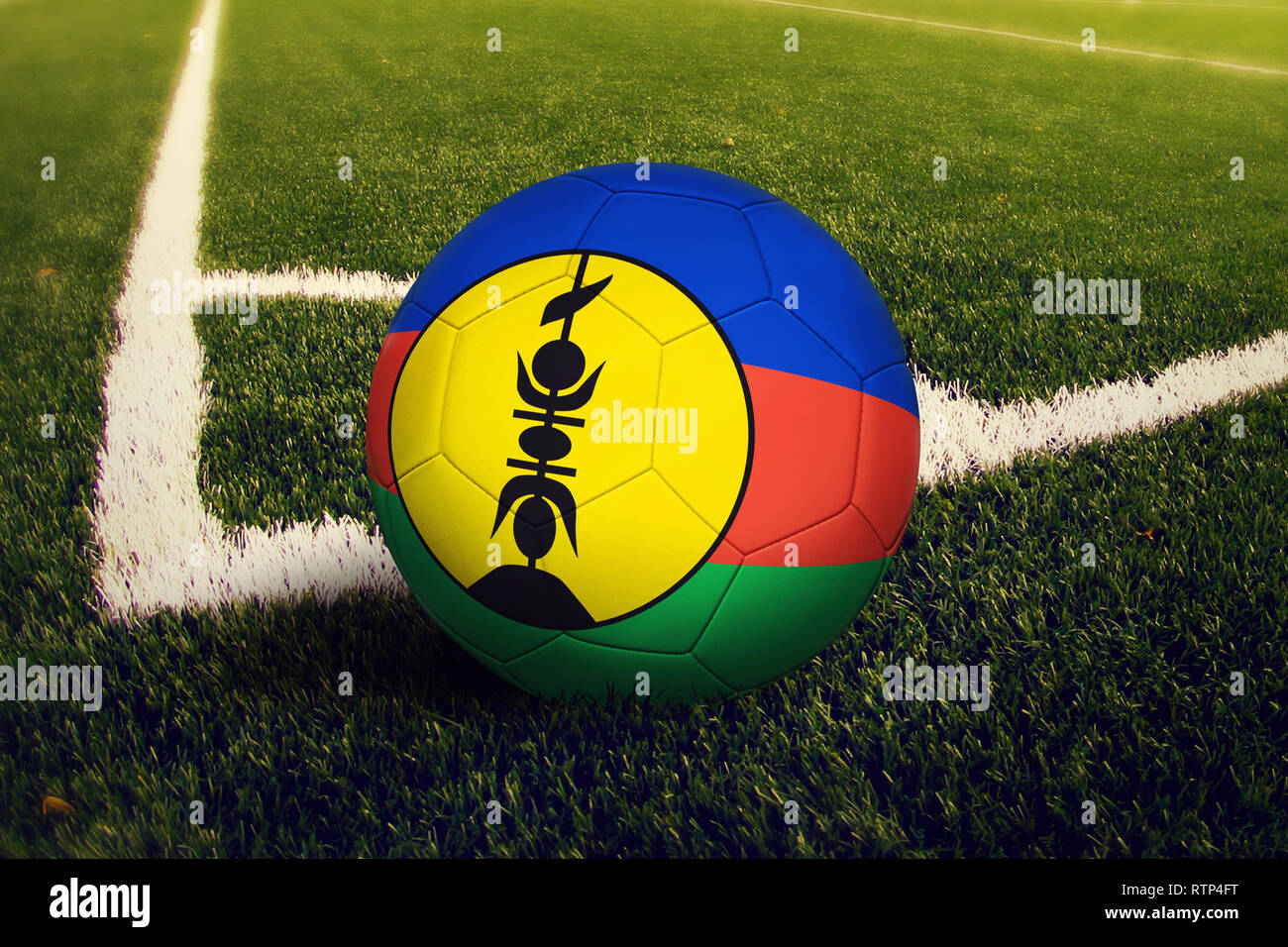 New Caledonia ball on corner kick position, soccer field background
