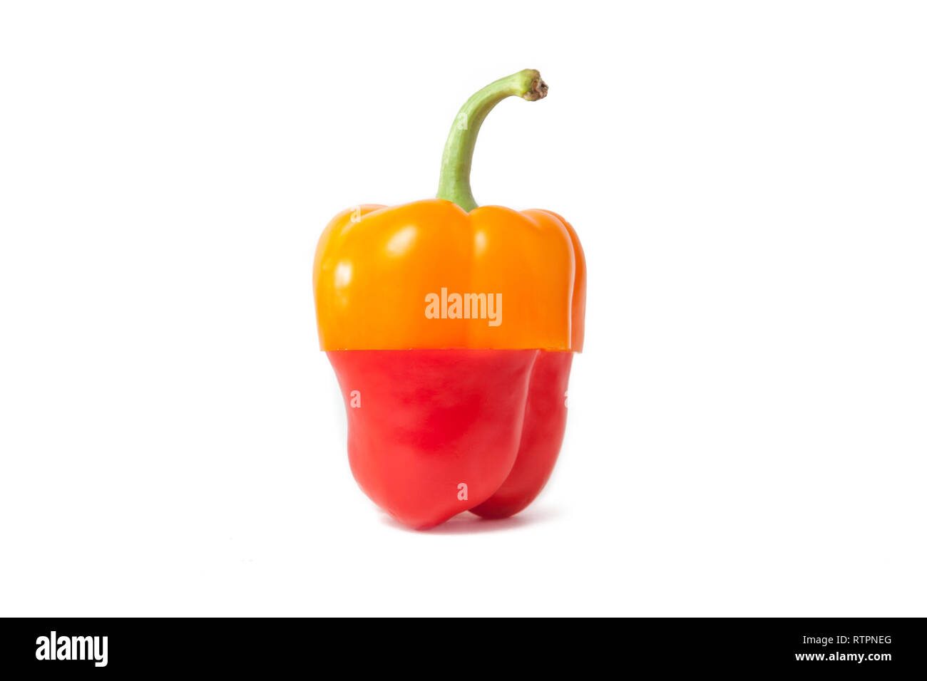 Red and yellow pepper on white background Stock Photo - Alamy