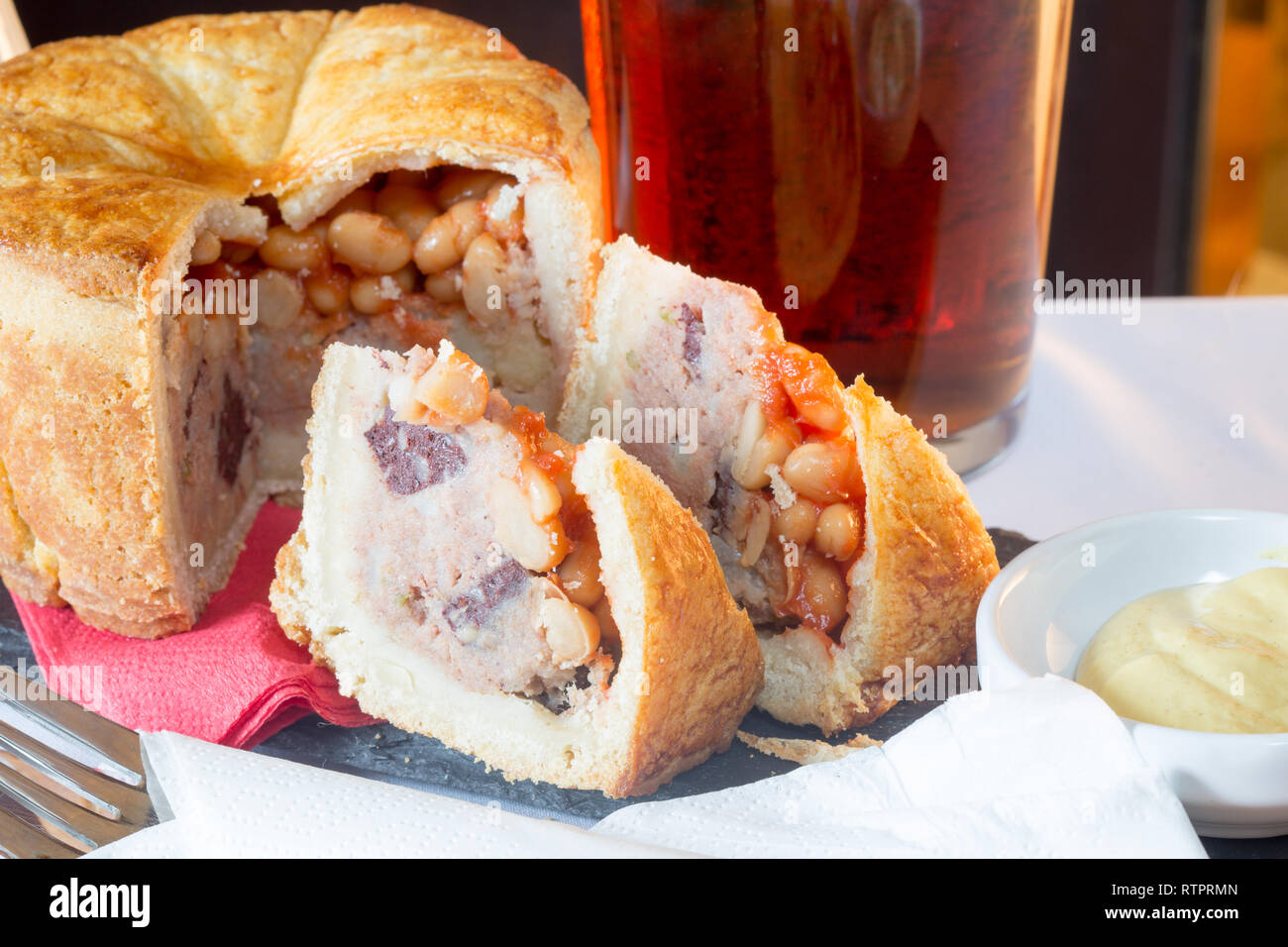 Pie and a pint of beer in an English pub Stock Photo Alamy