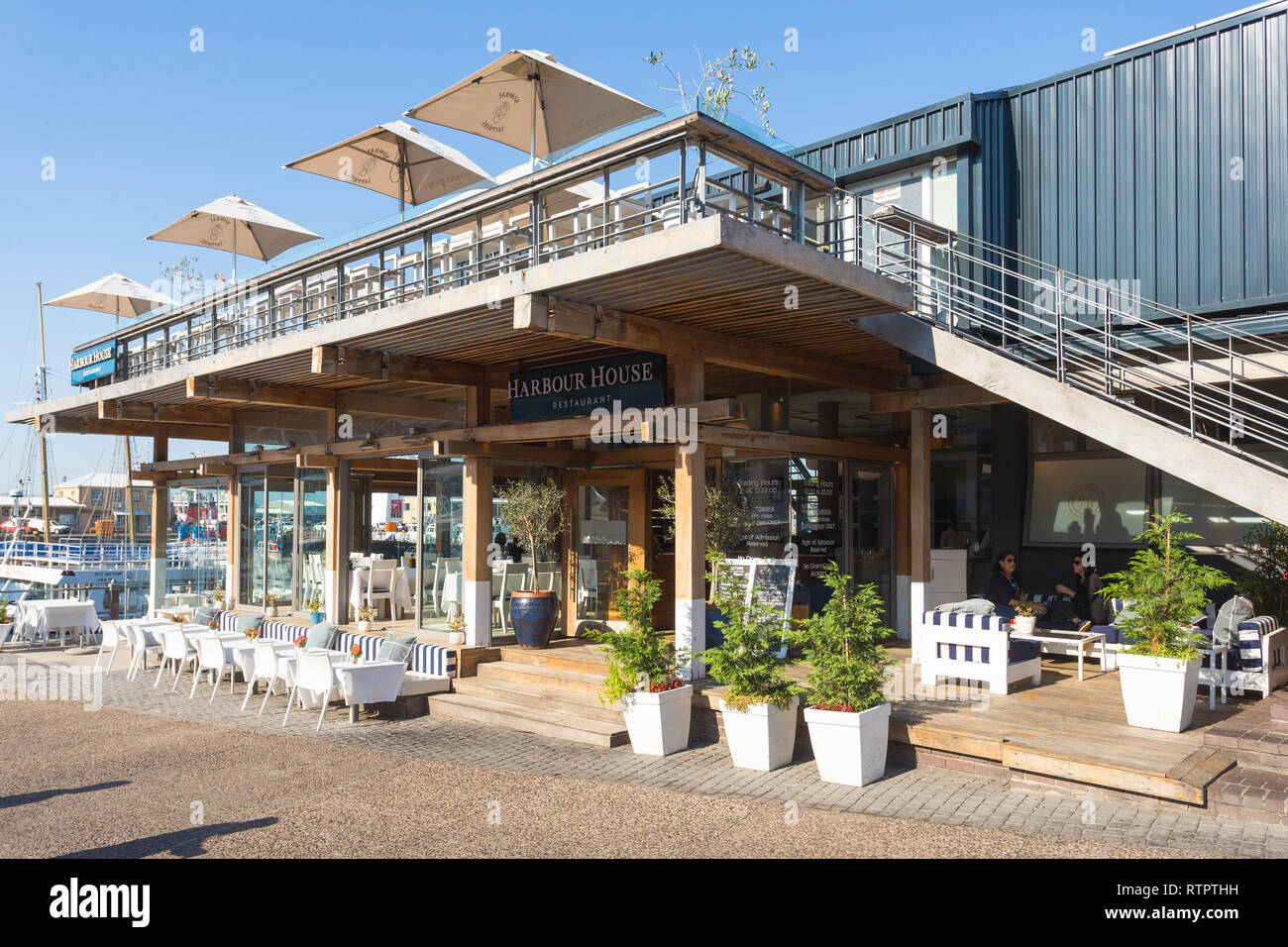 Harbour House fish restaurant and upmarket dining venue at the V&A Waterfront, Cape Town, South Africa on a sunny Winter day Stock Photo