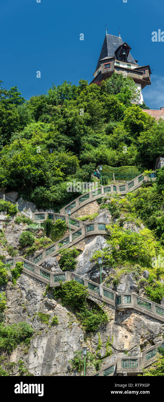 Graz, Stairs to Schlossberg hill and city clock tower Uhrturm, Austria Stock Photo
