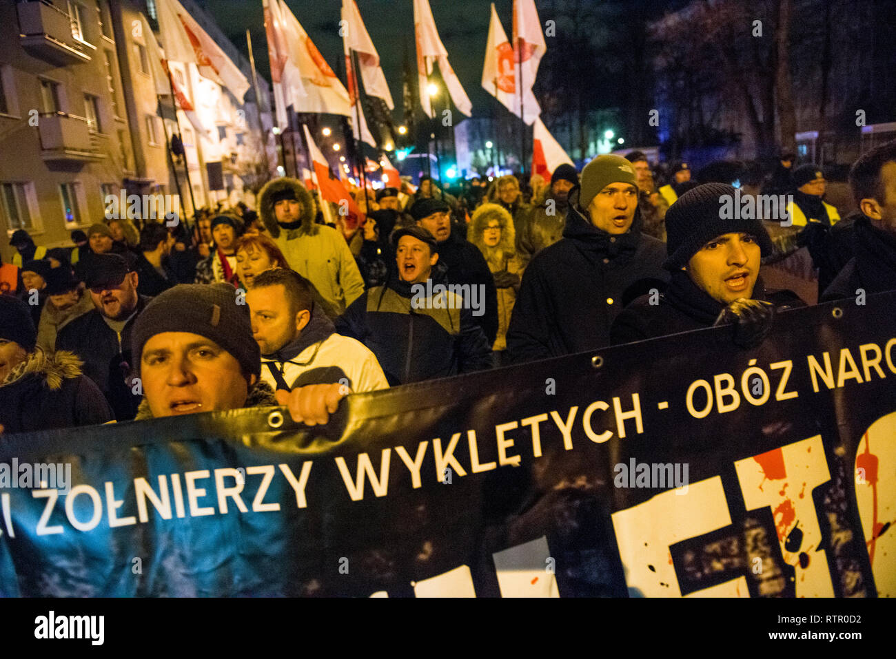 Nationalists seen with banners and flags during the commemorative march ...