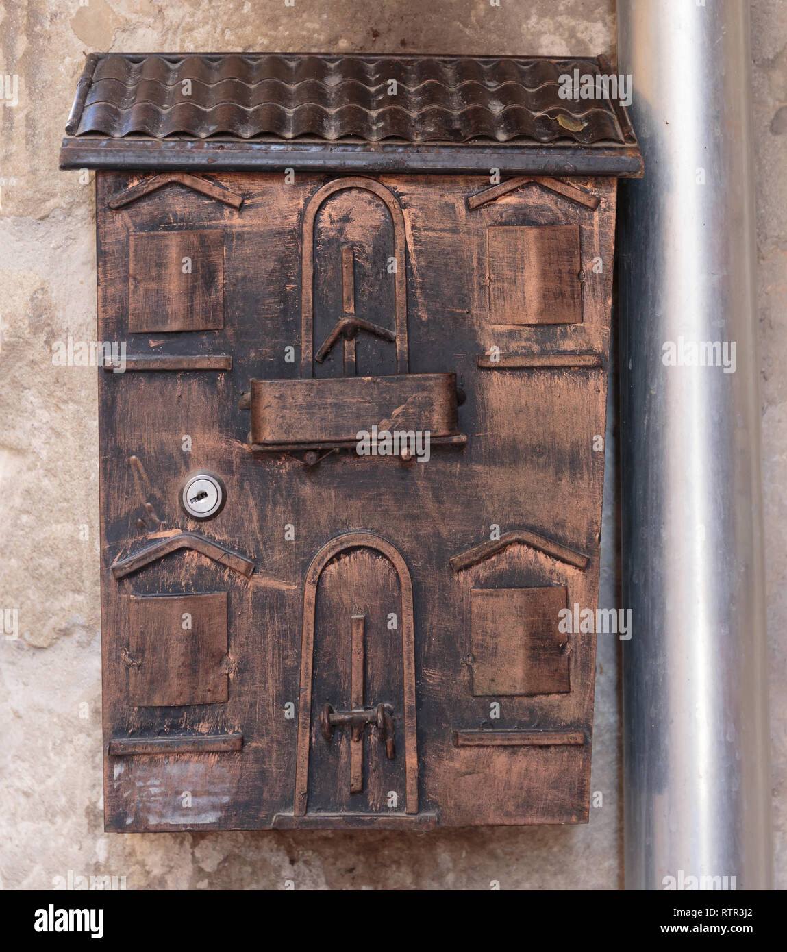 old mailbox on the wall Stock Photo