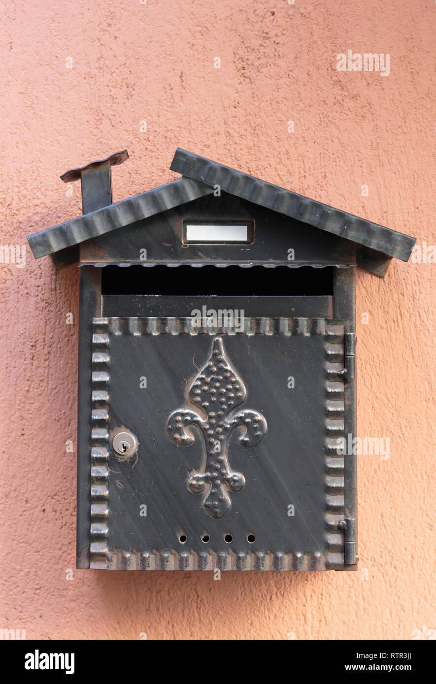 old mailbox on the wall Stock Photo