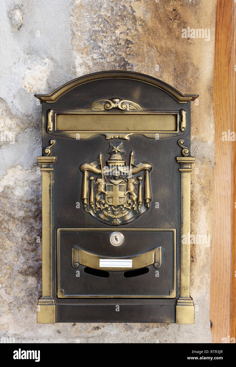 old mailbox on the wall Stock Photo