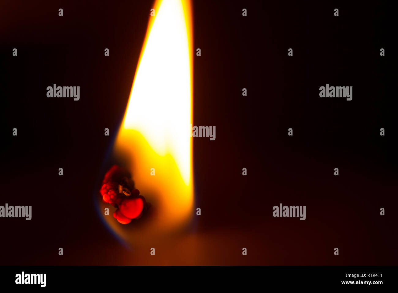 Close up of a burning candle flame. dark background Stock Photo - Alamy