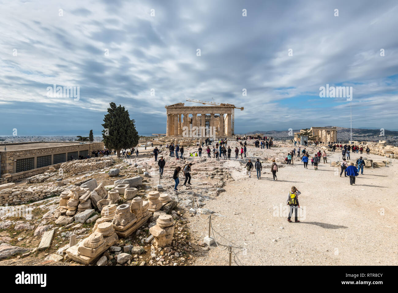 Athens, Greece - November 1, 2017: Many tourists visiting ancient temple Parthenon on Acropolis. Acropolis of Athens is an ancient citadel located on  Stock Photo