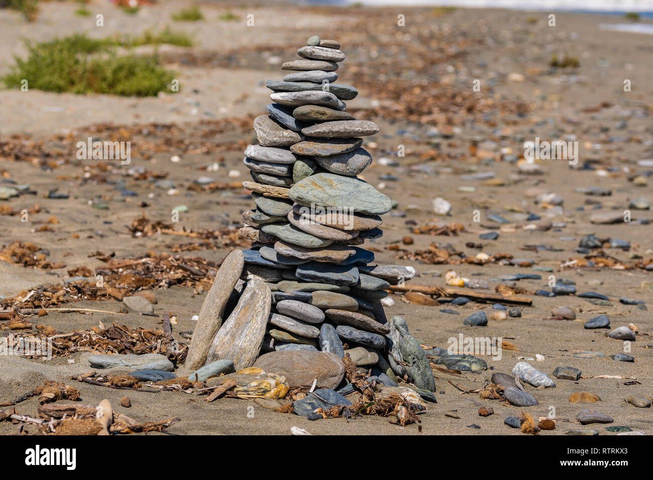Stone tower beach Stock Photo - Alamy