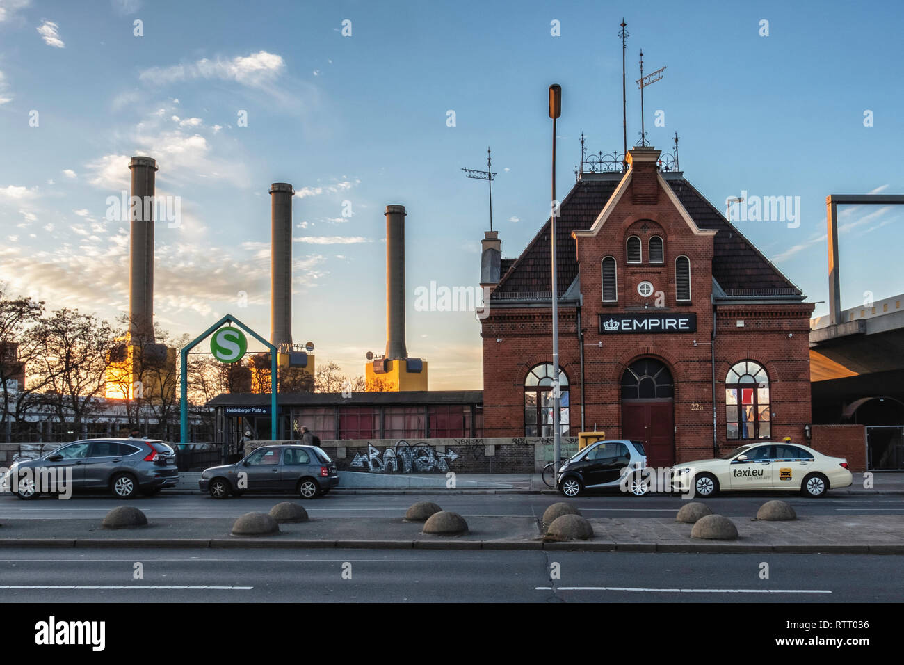 Berlin Wilmersdorf. Urban Landscape. Empire Club, Chimneys of Vattenfall Co- generation plant power station and entrance to Heidelberger Platz S-Bahn R  Stock Photo - Alamy