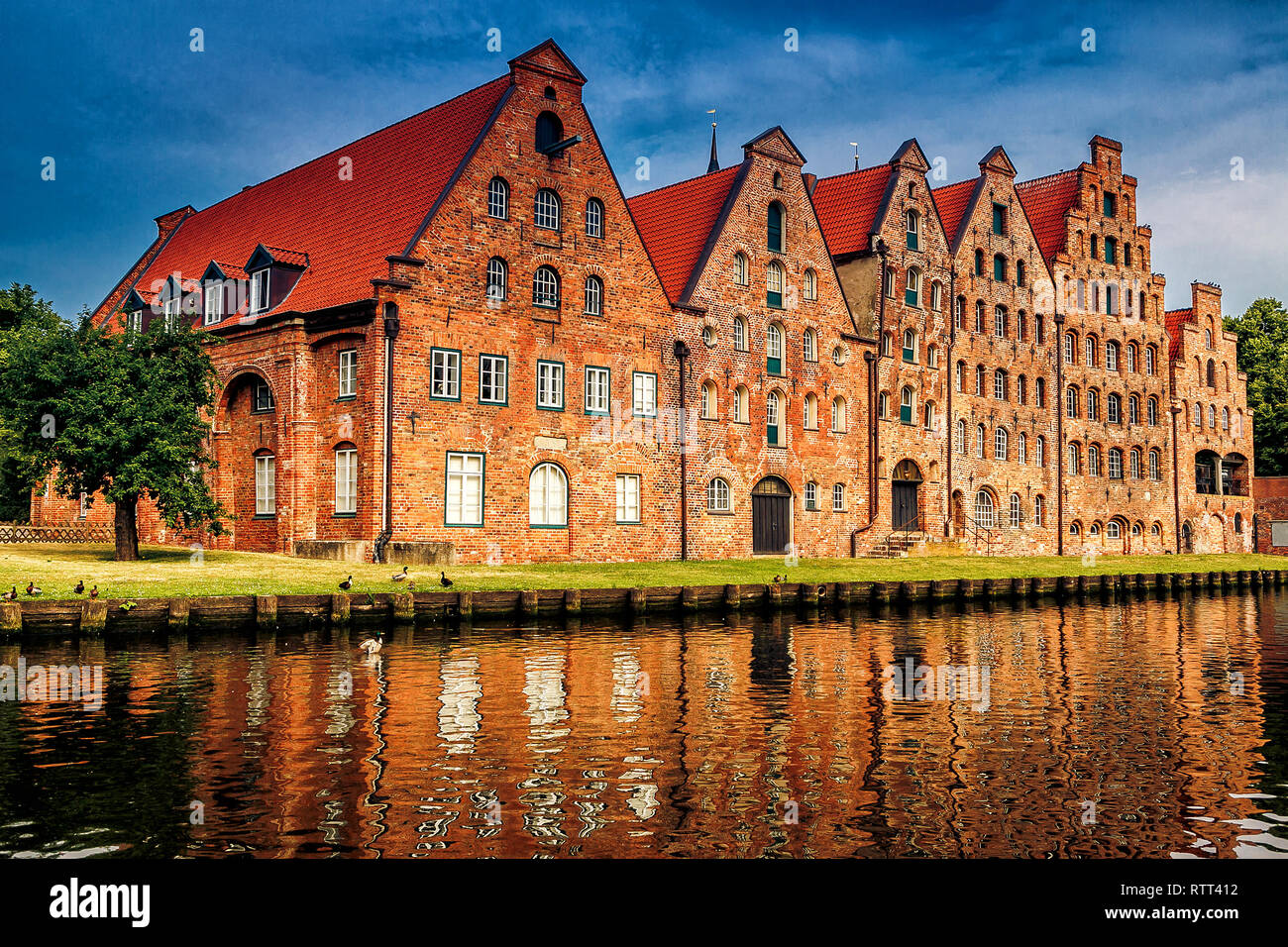 The Salzspeicher (salt storehouses), six historic brick buildings on the Upper Trave River in Luebeck, Schleswig-Holstein, northern Germany. Stock Photo