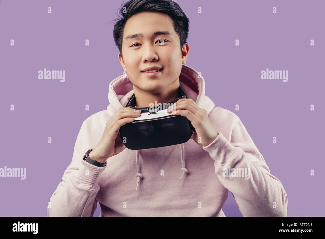 Augmented reality and virtual reality. Positive Chinese young hipster