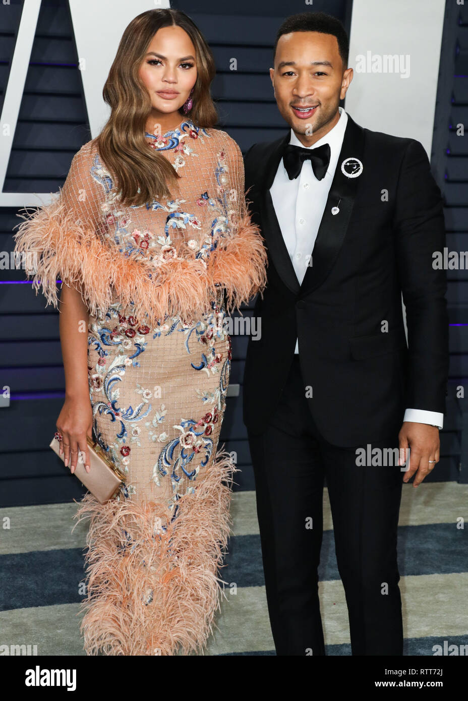 BEVERLY HILLS, LOS ANGELES, CA, USA - FEBRUARY 24: Model Chrissy Teigen and husband/singer John Legend arrive at the 2019 Vanity Fair Oscar Party held at the Wallis Annenberg Center for the Performing Arts on February 24, 2019 in Beverly Hills, Los Angeles, California, United States. (Photo by Xavier Collin/Image Press Agency) Stock Photo