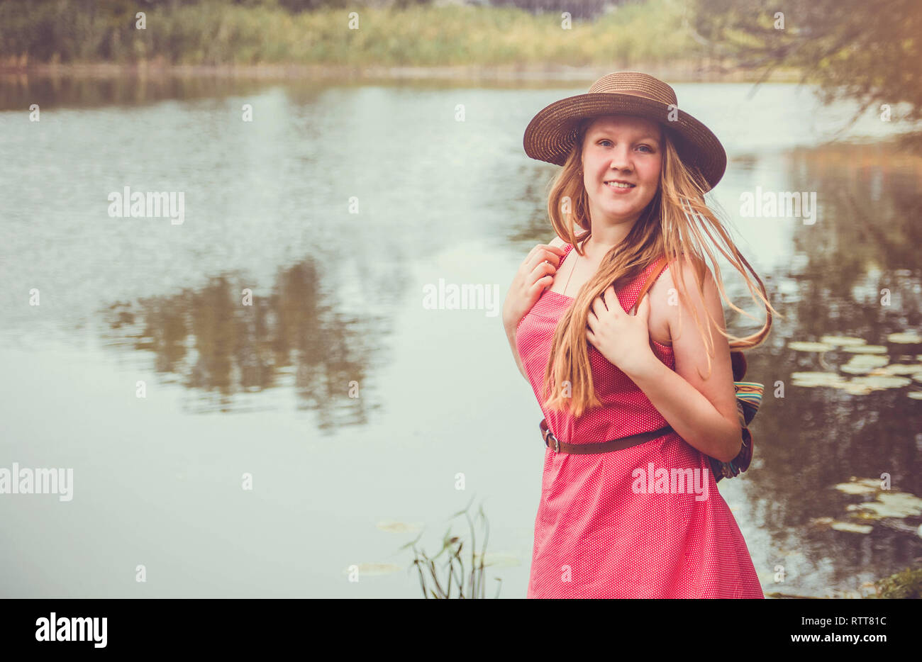 Woman traveler in hat walks hi-res stock photography and images - Alamy
