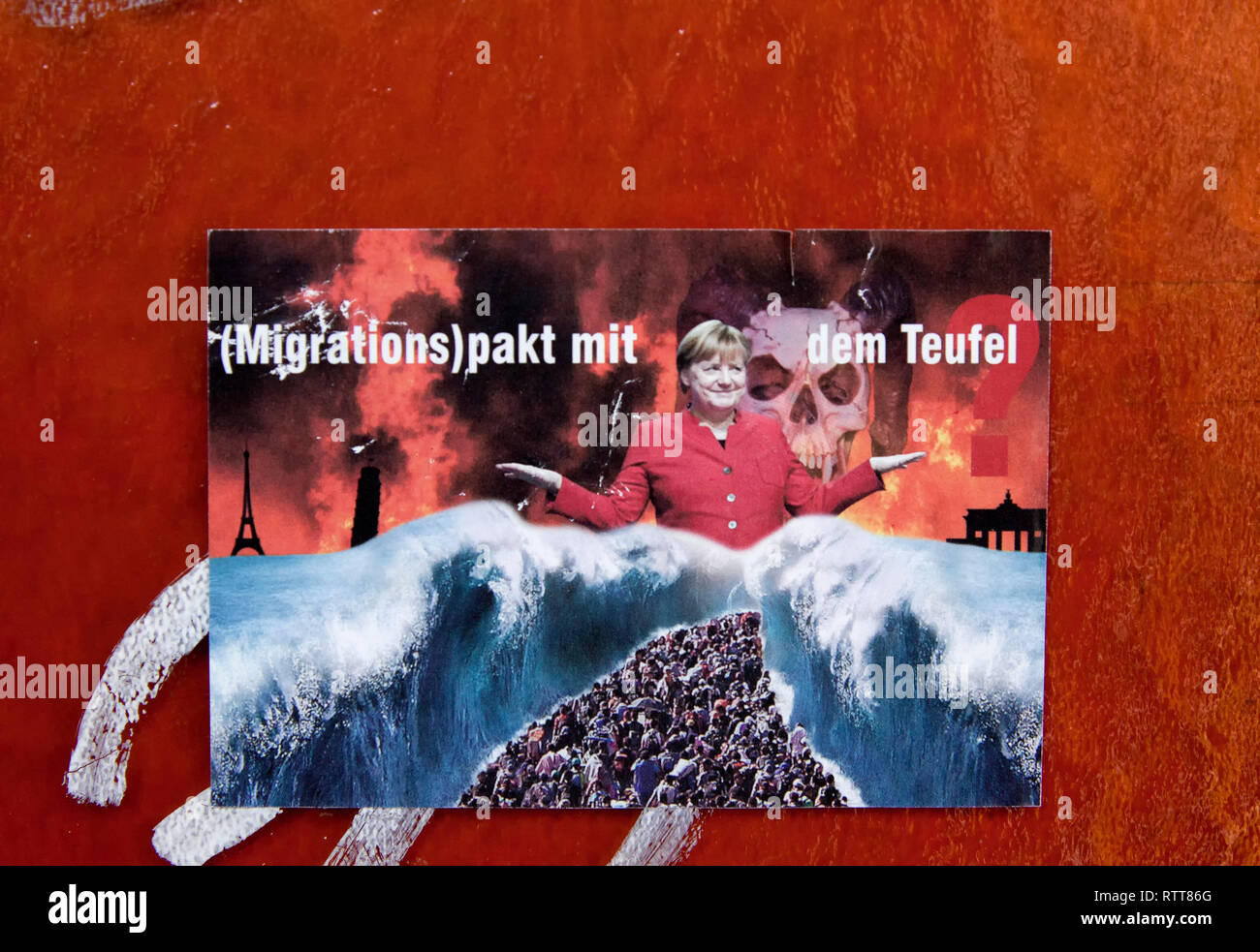 Sticker, migration pact with the devil, Angela Merkel, Berlin, Germany ...