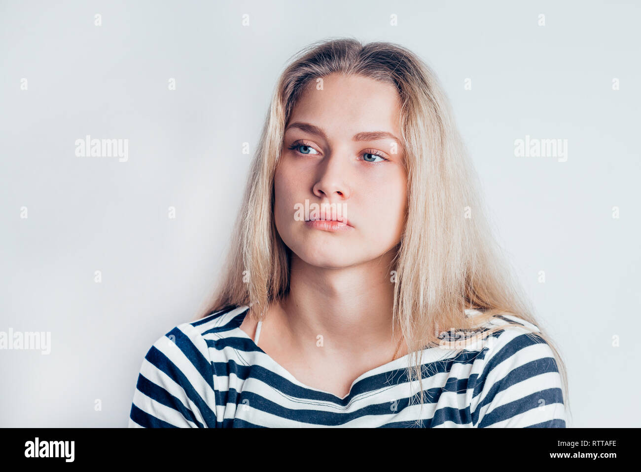 sad woman crying, looking aside on black background, closeup portrait,  profile view Stock Photo - Alamy