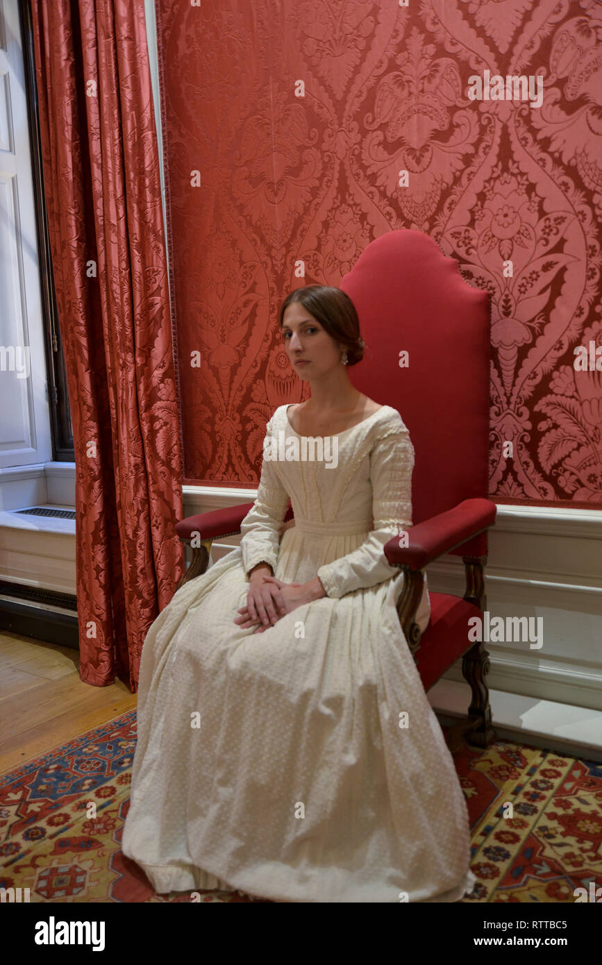 Queen Victoria Sits On A Throne At Kensington Palace The Room Is
