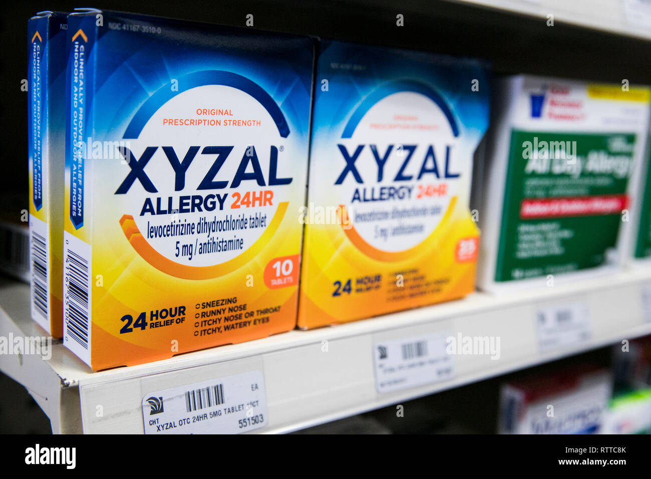 Xyzal Allergy over-the-counter medicine photographed in a pharmacy. Stock Photo