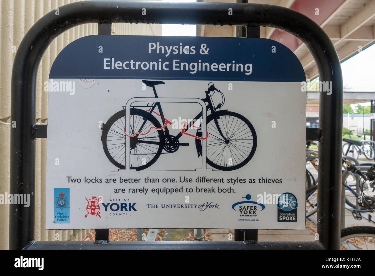 Cycle locking advice sign, University of York campus, Heslington, York, Yorkshire, UK. Stock Photo