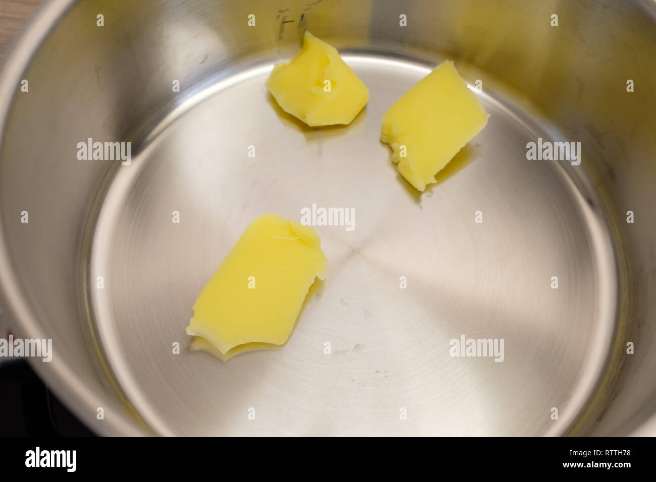 Buttered lard in a cooking pot as closeup Stock Photo Alamy