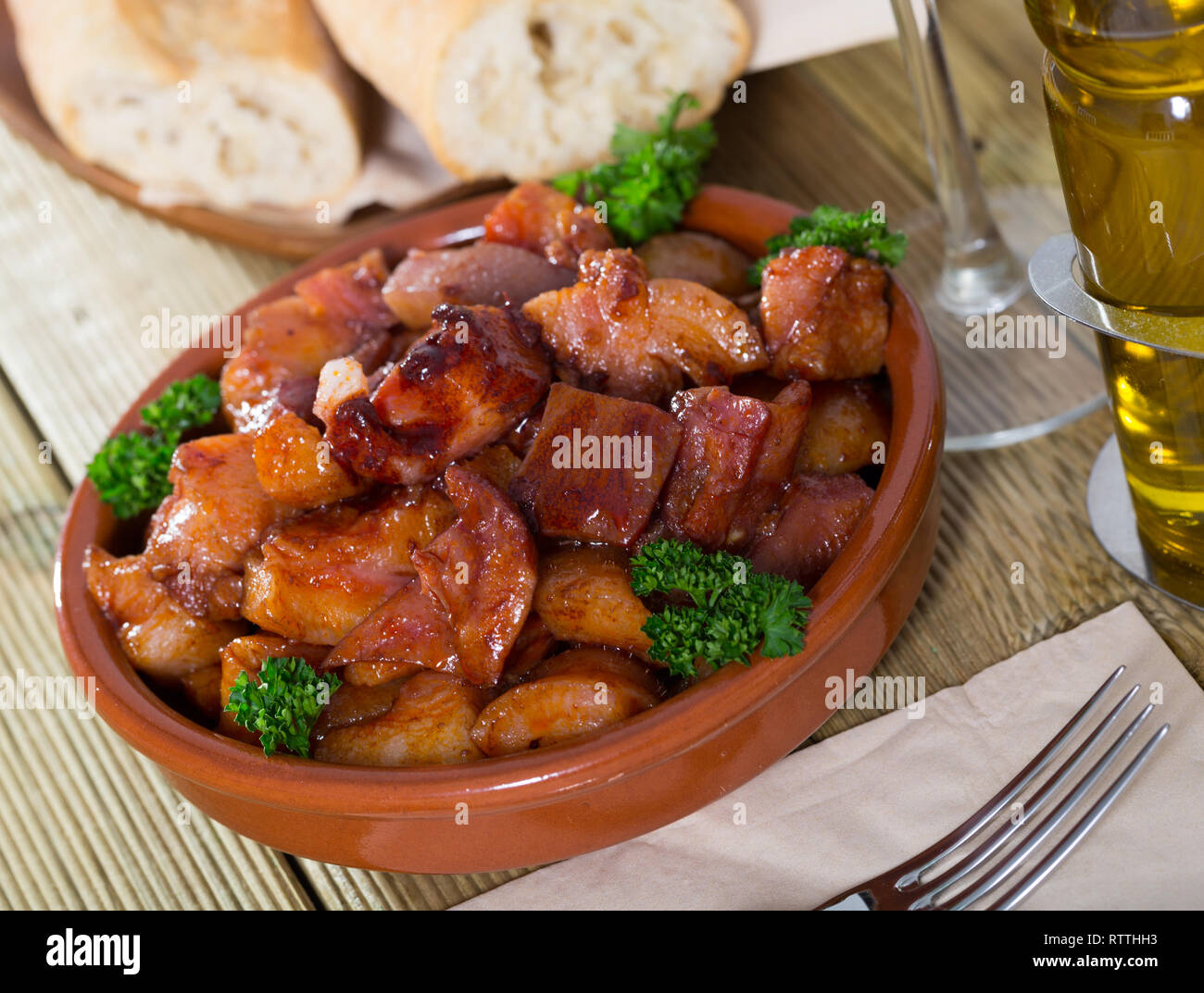 Morro De Cerdo Spanish Dish Roast Nose And Cheek Pigs With Parsley Stock Photo Alamy