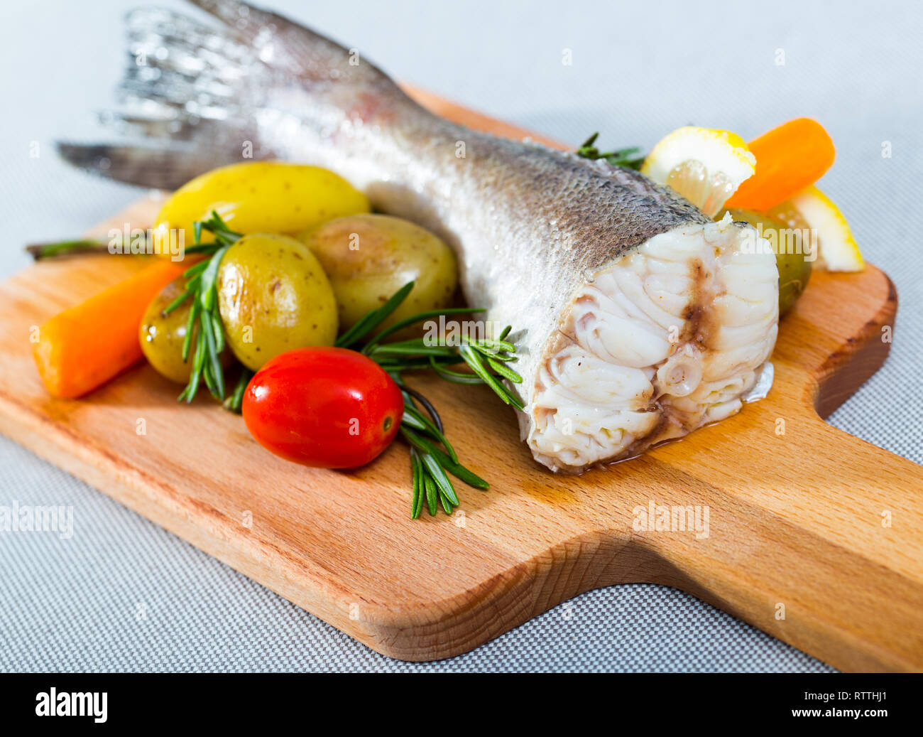 Baked hake tail with vegetables recipe - 250g hake or other cod-like ...