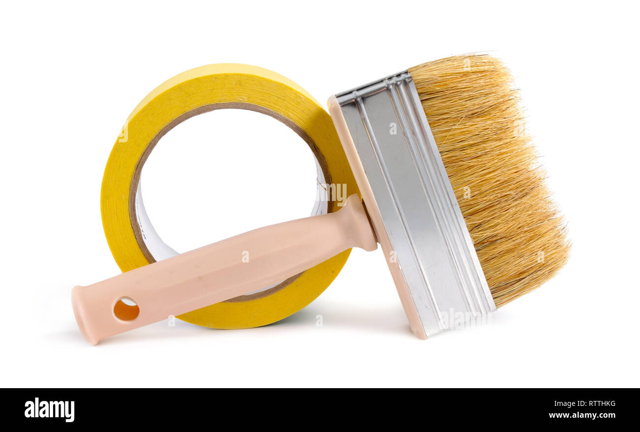 Paint brush and tape isolated on white background Stock Photo