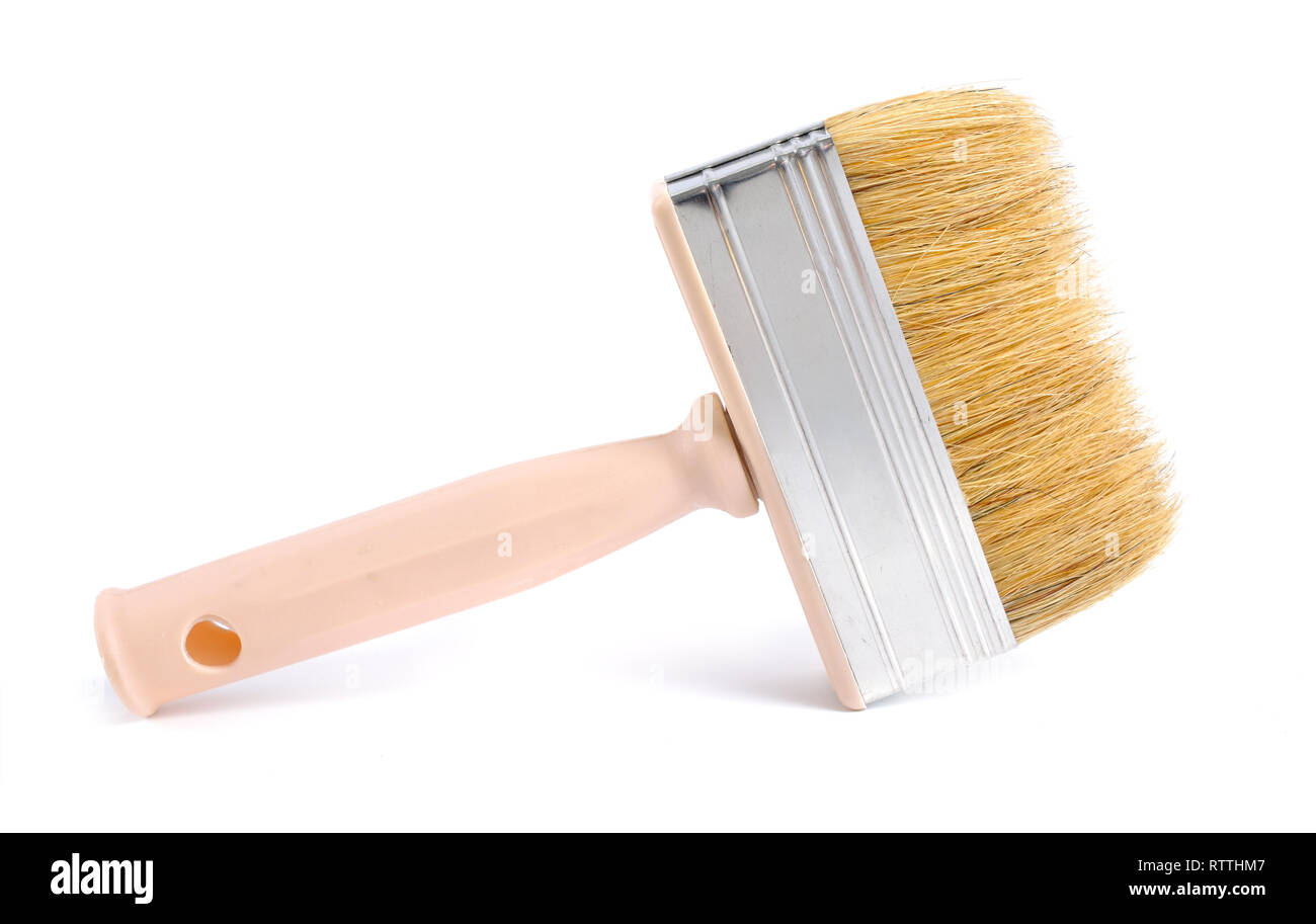 Paint brush and tape isolated on white background Stock Photo