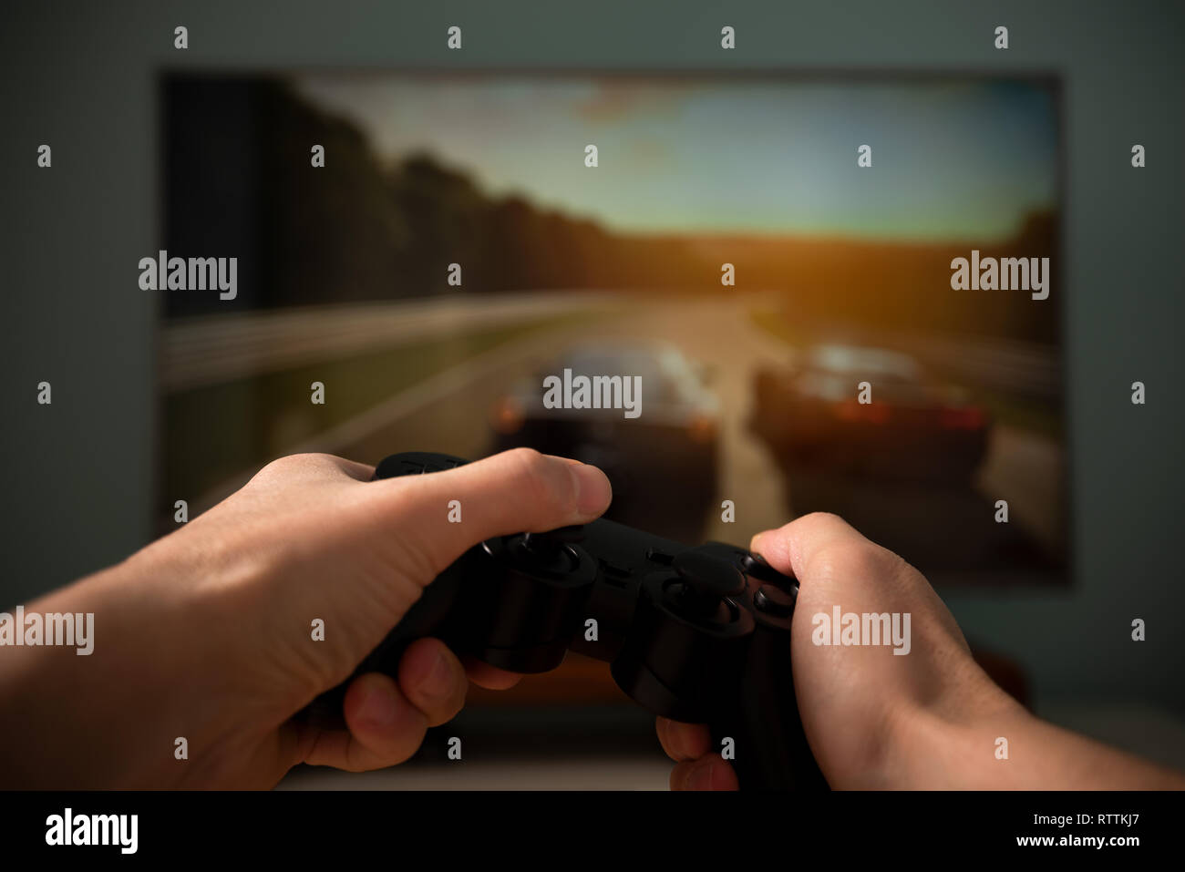 Car racing game with game console, game concept Stock Photo Alamy