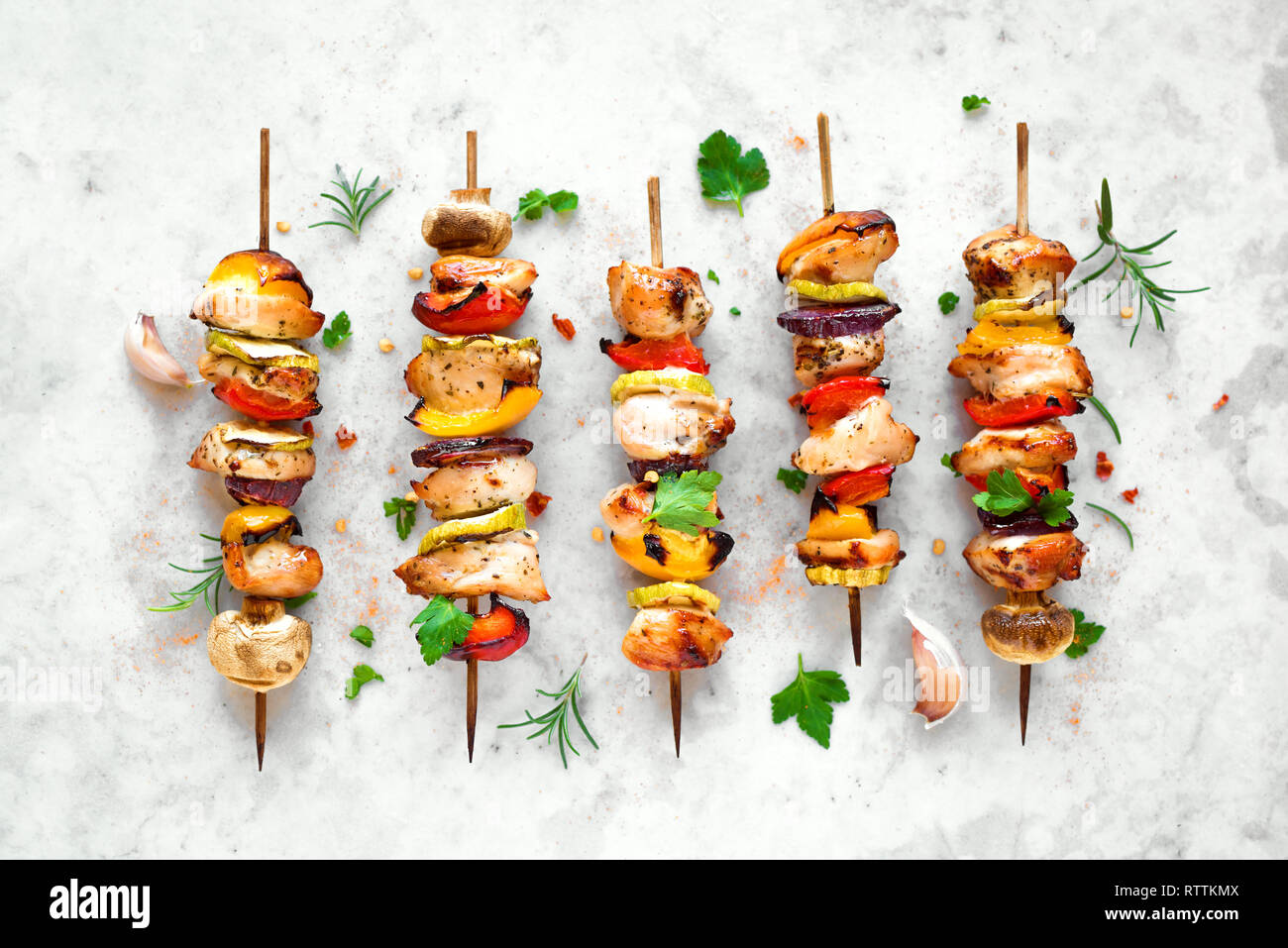 Grilled vegetable and chicken skewers with bell peppers, zucchini