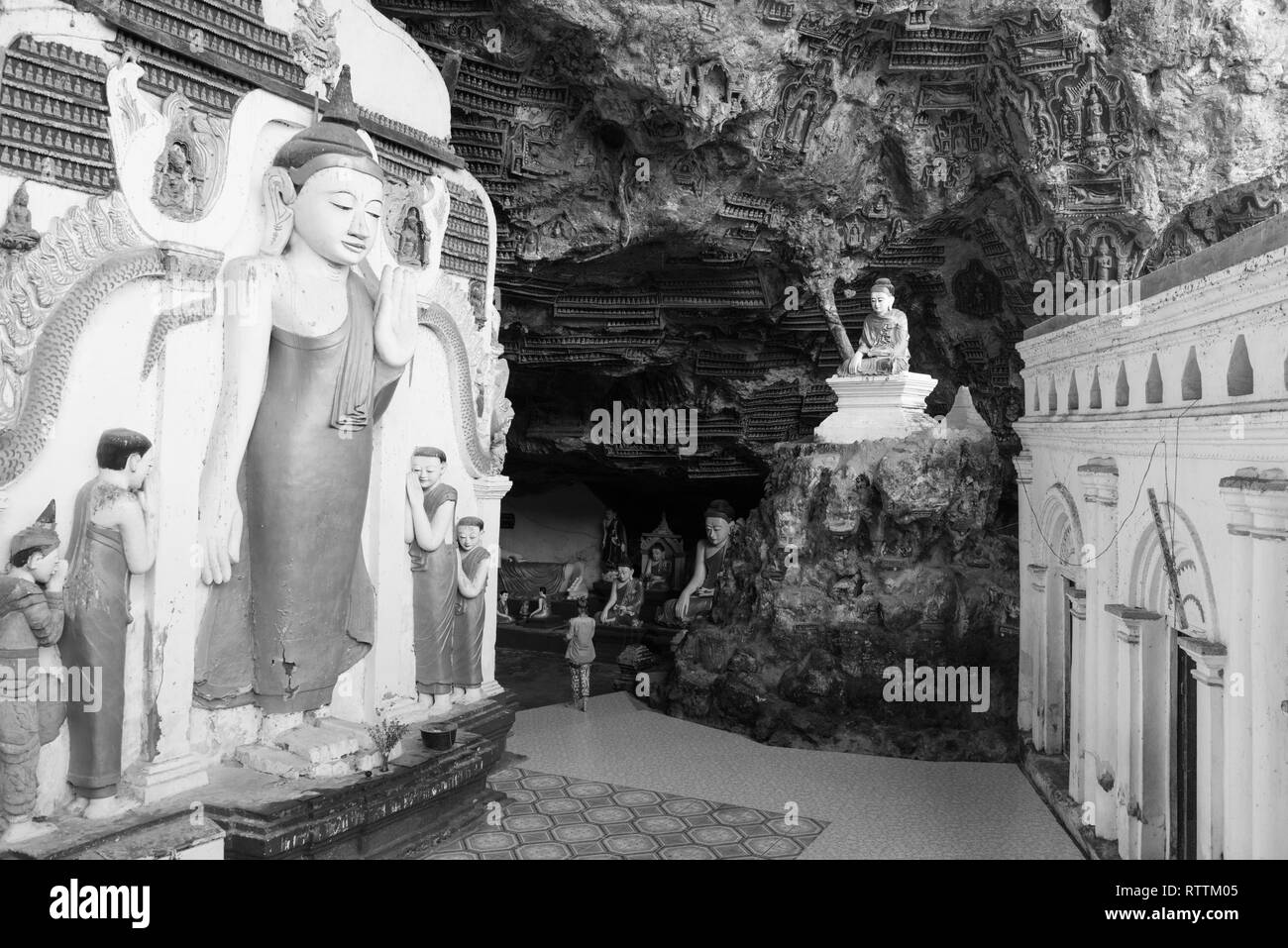 HPA-AN, MYANMAR - 19 NOVEMBER, 2018: Black and white picture of an important worship place at Kaw Goon Cave, landmark of Hpa-An, Myanmar Stock Photo