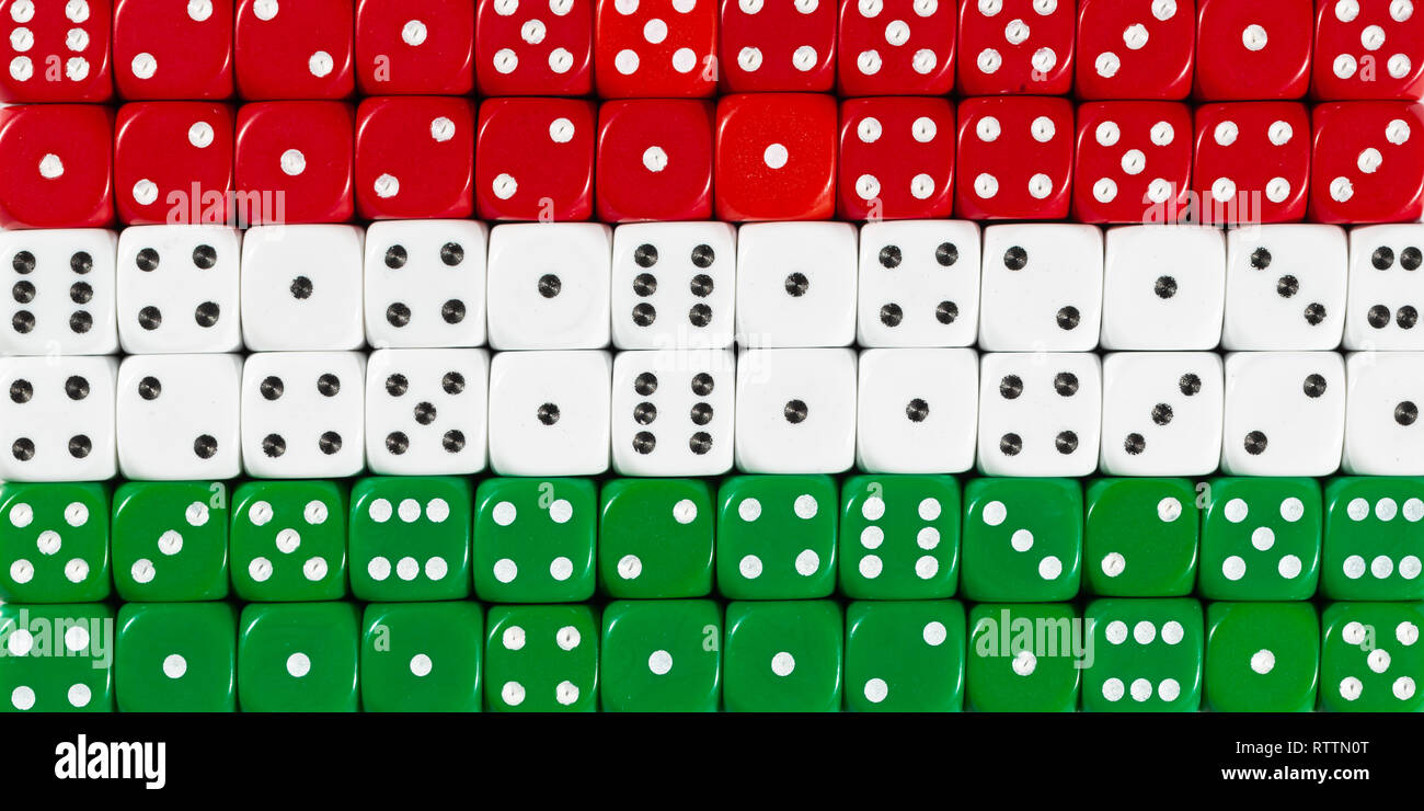 National flag of Hungary in background of dices Stock Photo