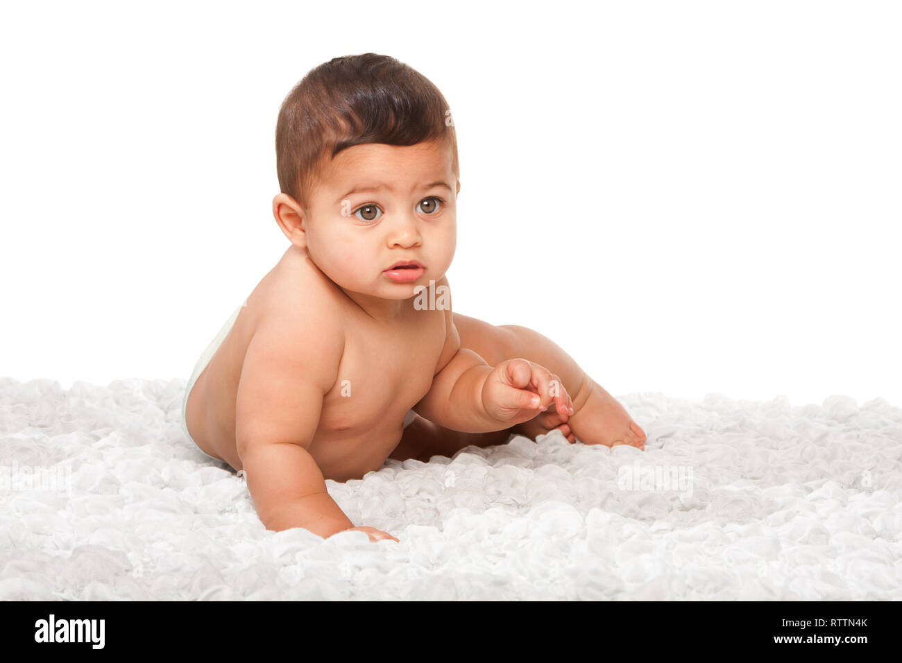 Cute happy innocent baby infant with big light green eyes, childhood concept, on white. Stock Photo