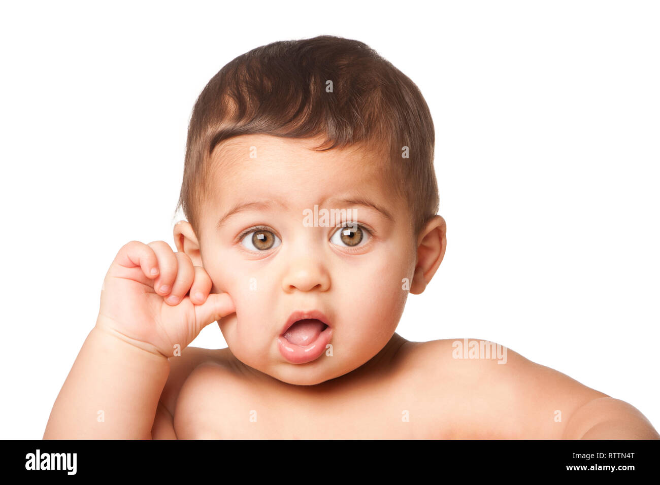 Cute happy innocent baby infant face with big light green eyes and hand thumb on cheek, childhood concept, on white. Stock Photo