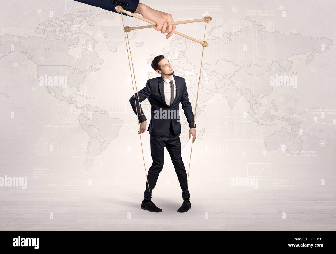 Puppet man with big city great power concept Stock Photo - Alamy