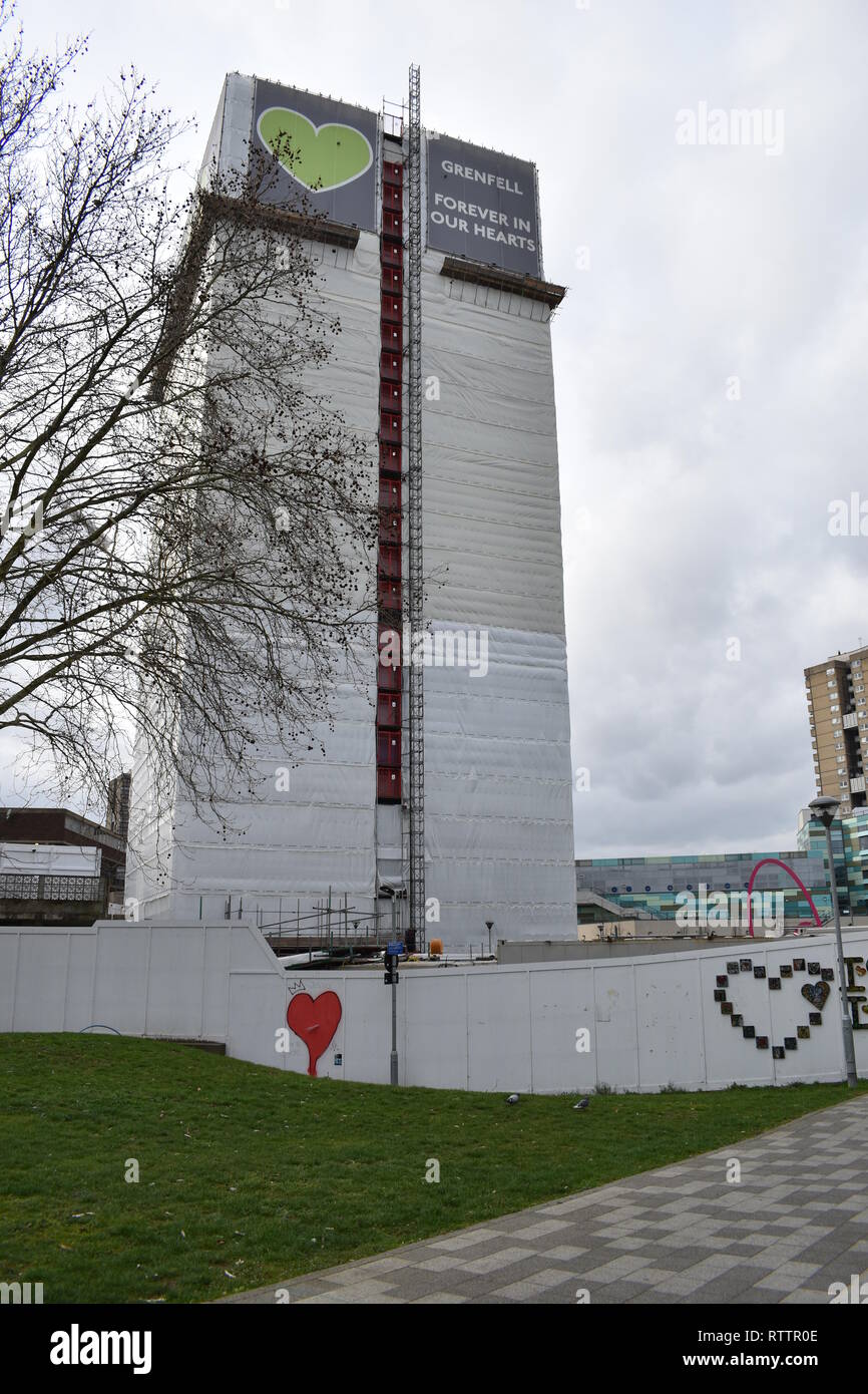 View of Grenfell Tower, with tarpaulin cover and scaffold. The major fire which was 14th June 2019, is subject of a Public Inquiry which continues. Stock Photo